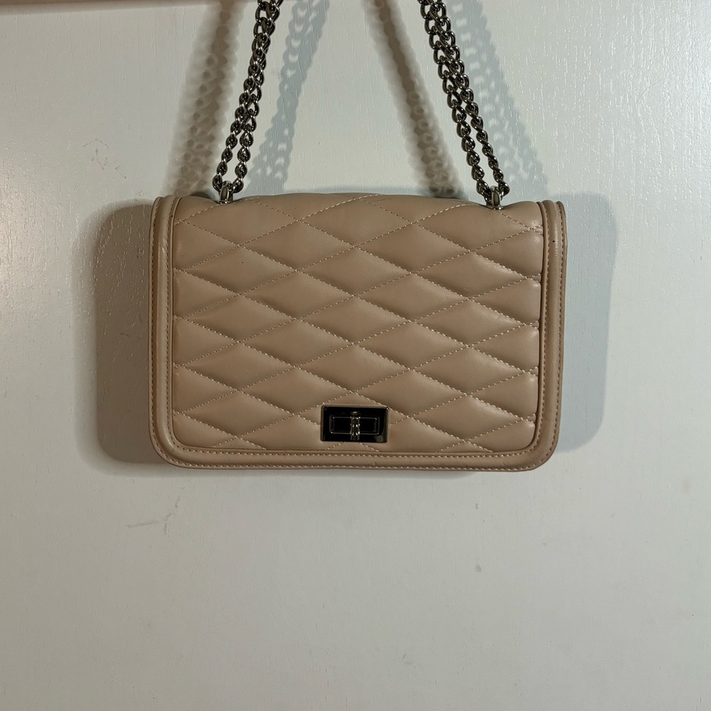 Express Quilted Nude Clutch with chain belt straps. Used and in great condition